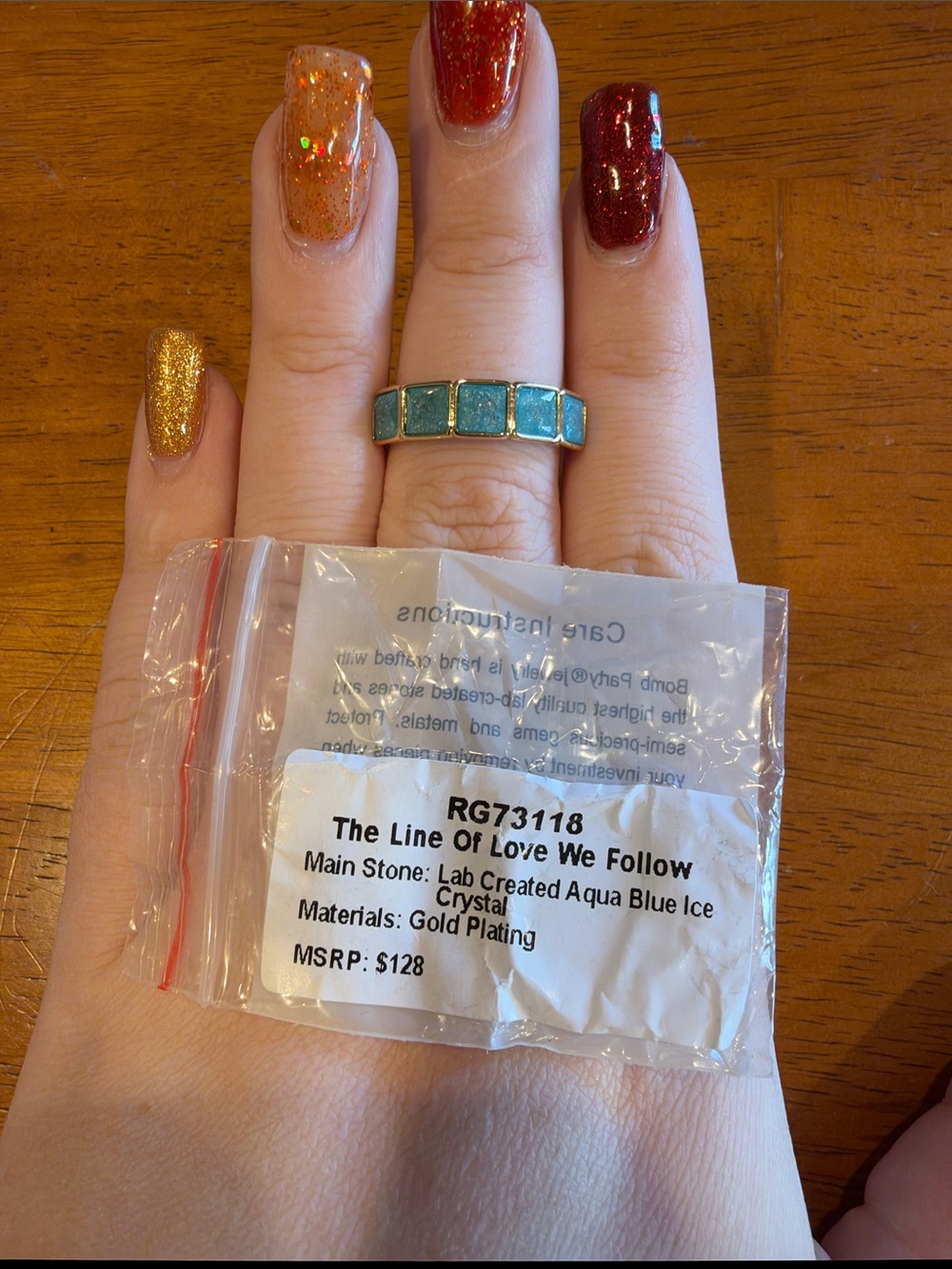 Gold-Plated Ring with Aqua Blue Ice Crystals